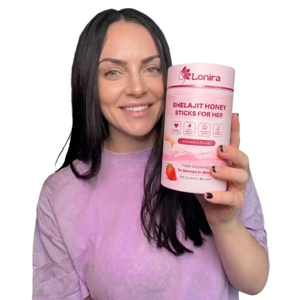Smiling woman holding softgel